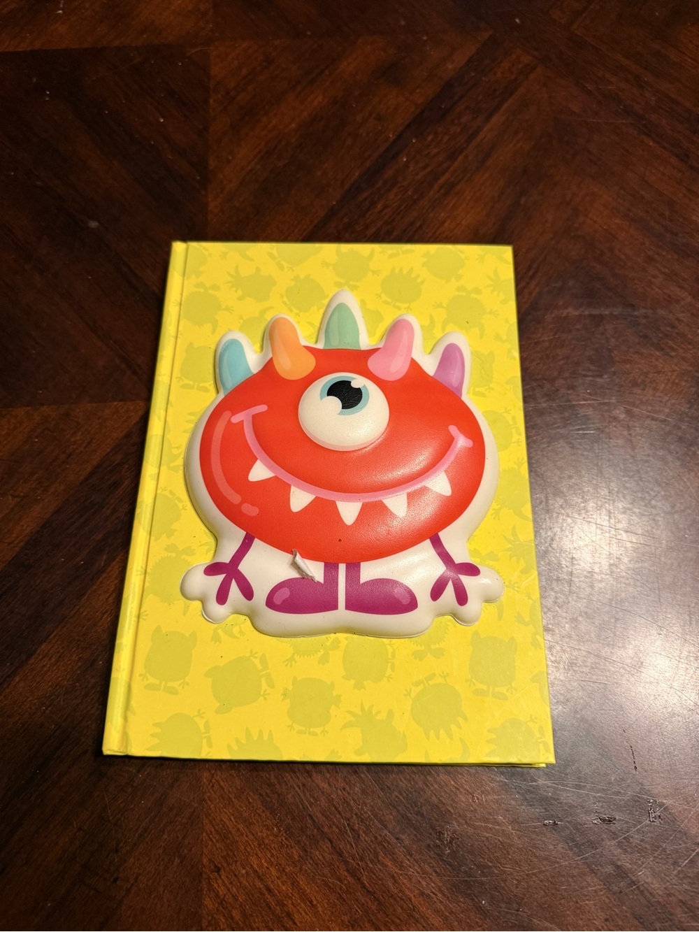 Yellow Monster Hardcover Journal with Red Smiling Monster Puffy!